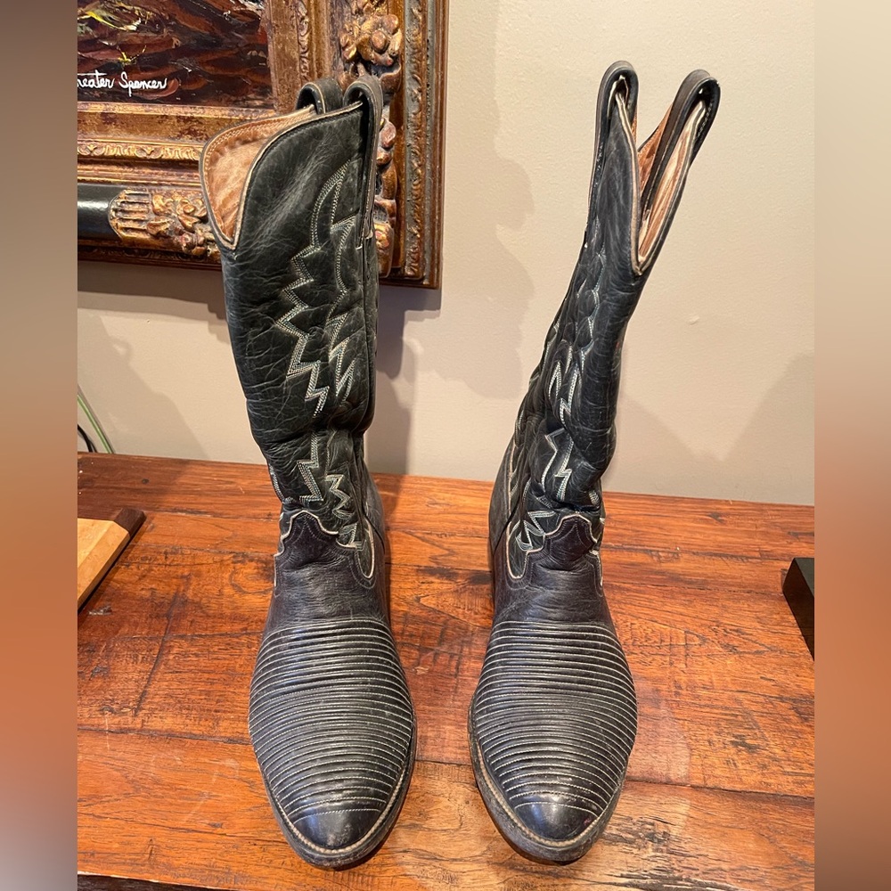 Black Leather Cowboy Boots with custom stitching.